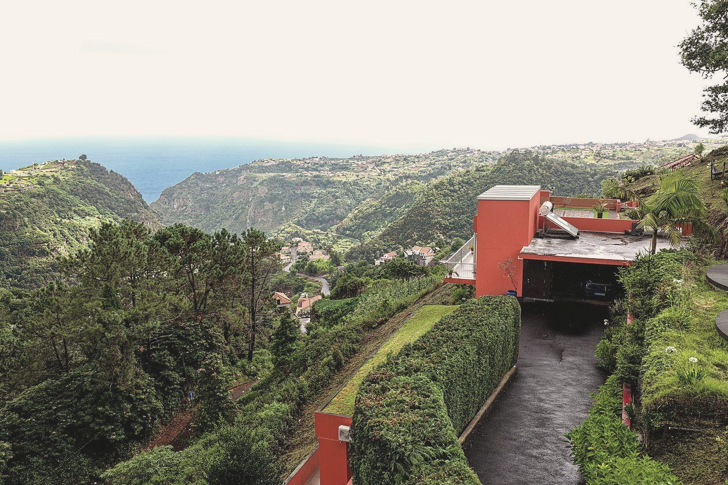 The drive down to the villa, the coast behind