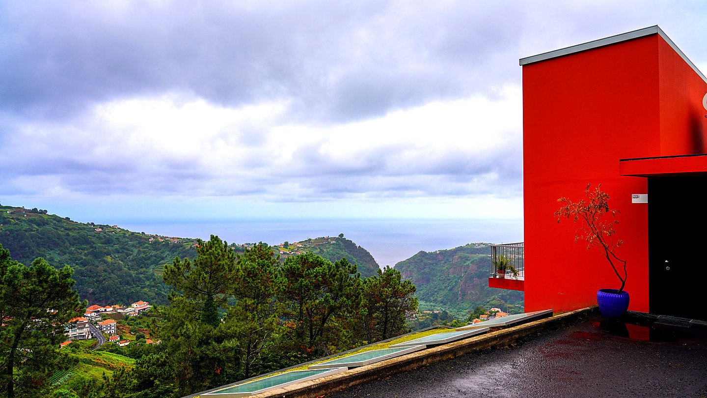 The orange tower at the front door, looking down the valley to Santana and the sea